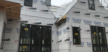 Home under construction with Marvin windows and Typar Talbert wrap