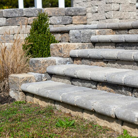 Stone steps and pavers in a patio setting