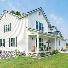 Offset view of a home with Cedar MAX siding