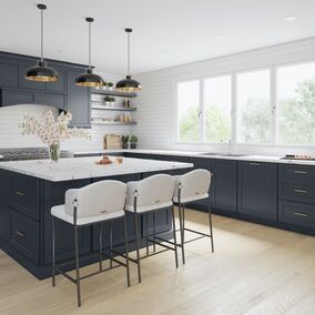 Kitchen featuring indigo blue cabinets and white countertops