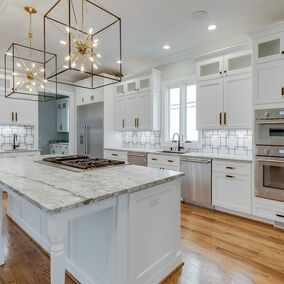 Kitchen Cabinet Distributors white kitchen with marble island top