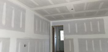 Photo of drywall installed on a Residential Construction job