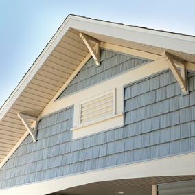 Image of Fypon decorative louvers and gable vents on a home exterior