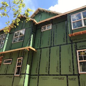 Exterior of home under construction covered in Huber Zip System